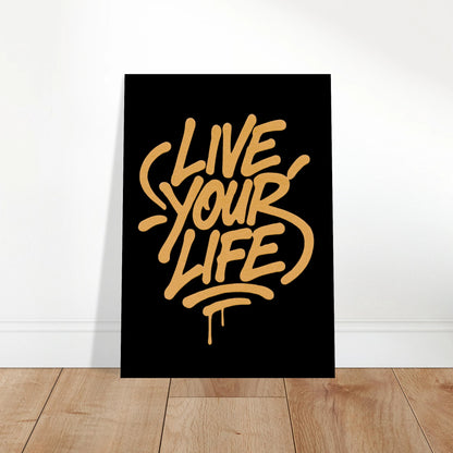 Live Your Life gold poster leaning on floor – motivational wall art with graffiti look