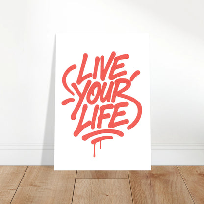 Live Your Life red poster leaning on floor – motivational graffiti style wall art for home or office