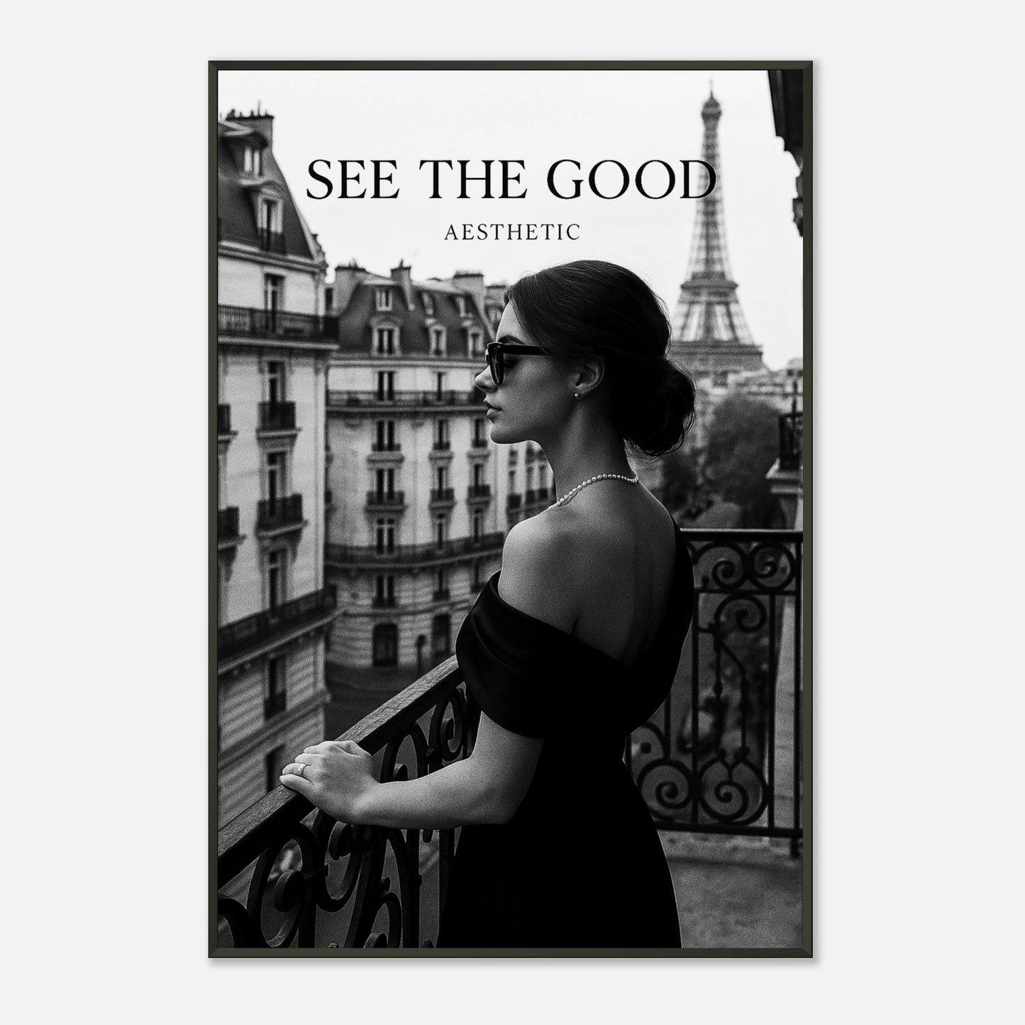 Close-up of Paris Noir “See The Good” black and white wall art in black metal frame, cinematic Paris photography poster